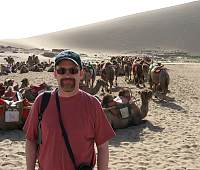 Camels, Sand Dunes, and me near Dunhuang